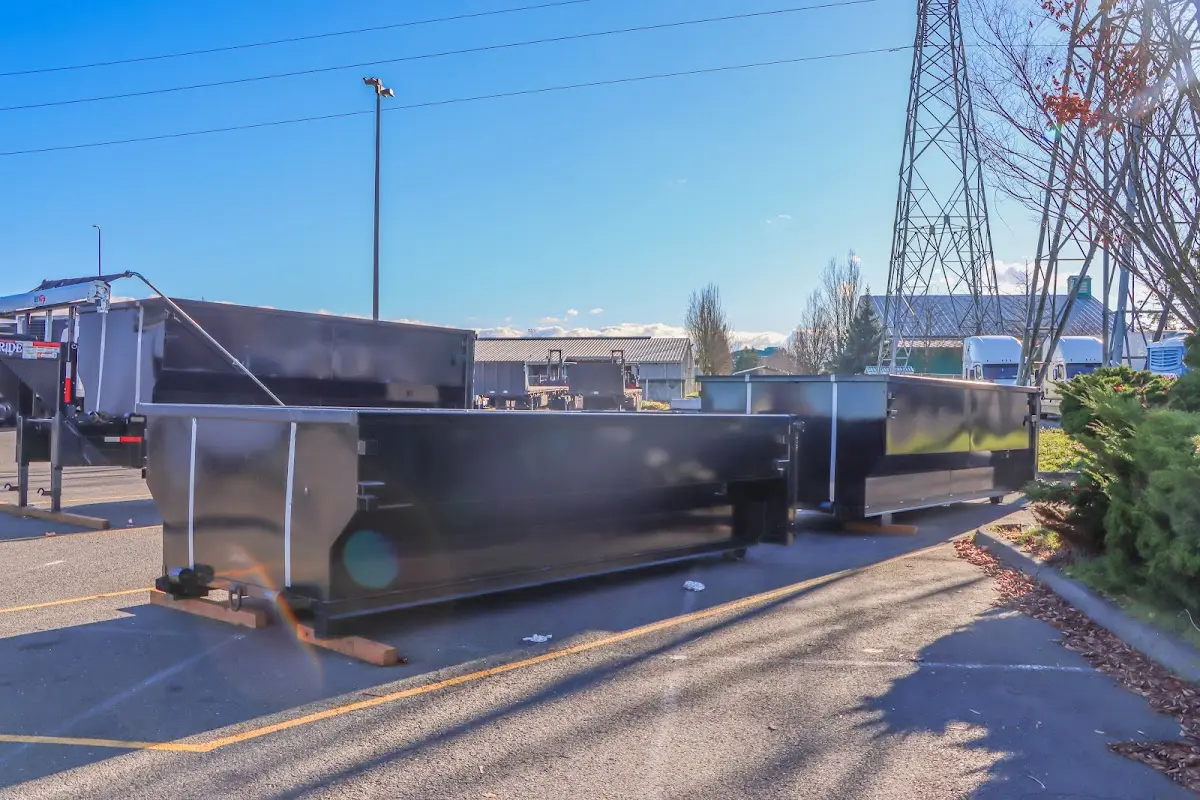 Roll-off dumpster ready for waste disposal at job site for 12 Yard Dumpster Rental in Riverview